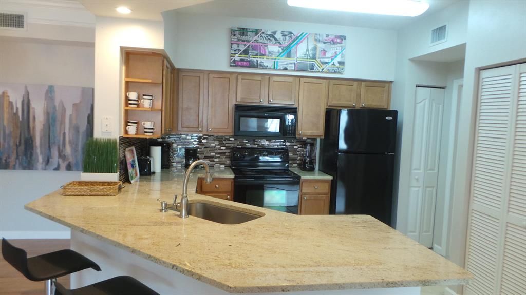 Photo of 9309 Myrtlewood Circle W, Palm Beach Gardens, FL 33418 (MLS # R10864792)