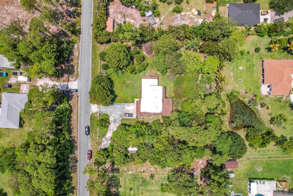 Photo of 12821 N 86th Rd Road N, The Acreage, FL 33412 (MLS # B26021488)