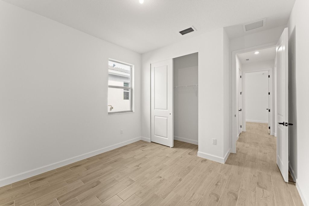 Photo of 10032 SW Carnelian Street, Port Saint Lucie, FL 34987 (MLS # B26020678)