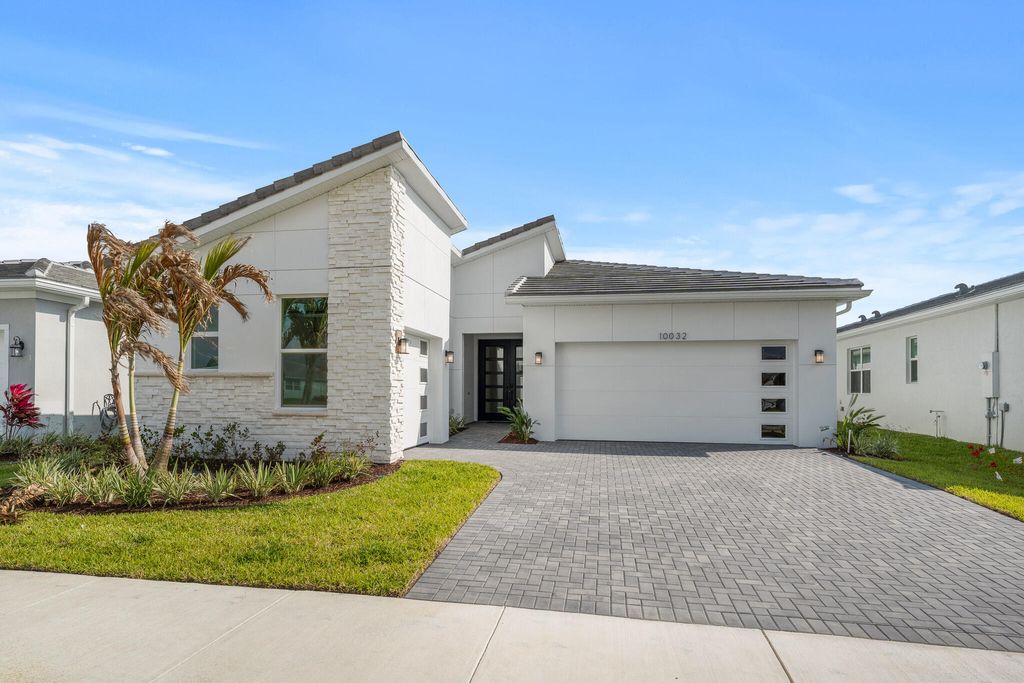 Photo of 10032 SW Carnelian Street, Port Saint Lucie, FL 34987 (MLS # B26020678)