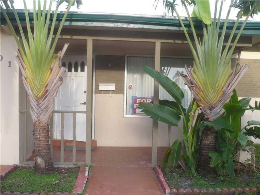 Photo of 701 NW 74th Avenue, Hollywood, FL 33024 (MLS # B26017103)