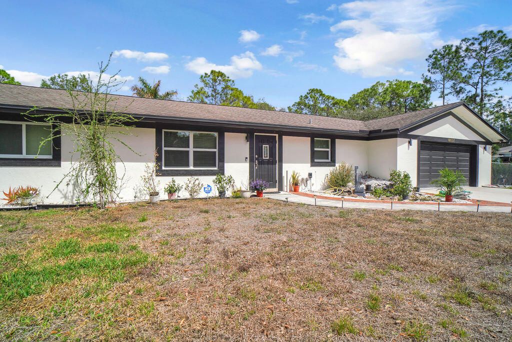 Photo of 18057 N 40th Run N, The Acreage, FL 33470 (MLS # B26015654)