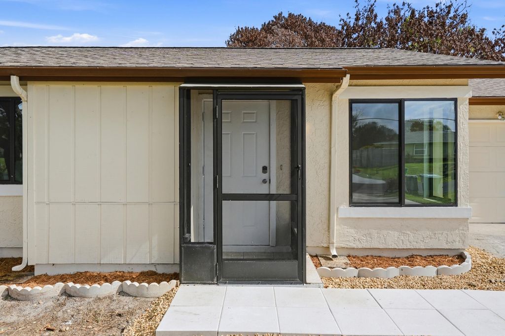 Photo of 295 NW Archer Avenue, Port Saint Lucie, FL 34983 (MLS # B26019680)