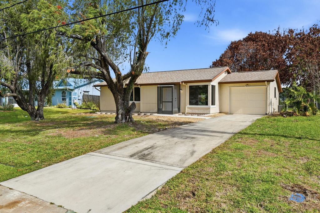 Photo of 295 NW Archer Avenue, Port Saint Lucie, FL 34983 (MLS # B26019680)