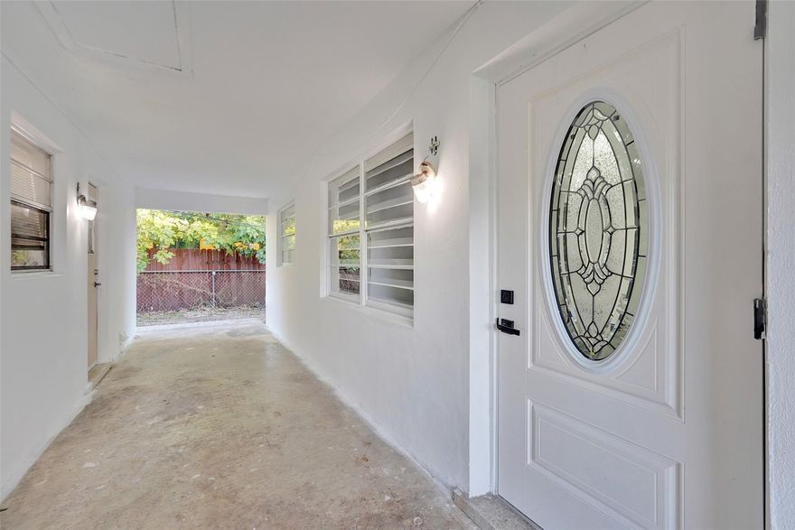 Turn key and move-in ready, ALL AGES. This remodeled 2 bedroom, 1 bath unit in a triplex features a fresh look with modern gray flooring and bright, open living spaces. The layout offers comfortable room sizes with plenty of potential to make it your own. The updated kitchen showcases a marble backsplash, crisp white cabinetry, and stainless steel appliances for a clean and functional feel. FAST APPROVAL available for a quick and easy move-in.