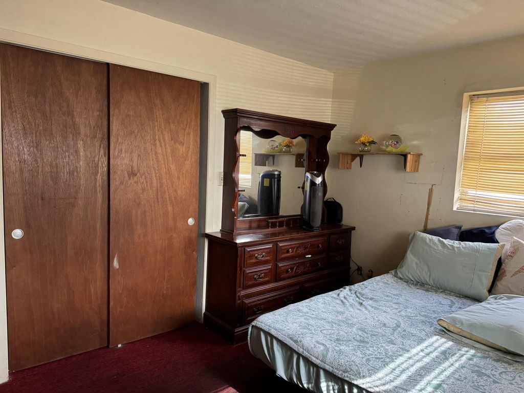 Photo of 601 NW 7th Street, Belle Glade, FL 33430 (MLS # R10987183)