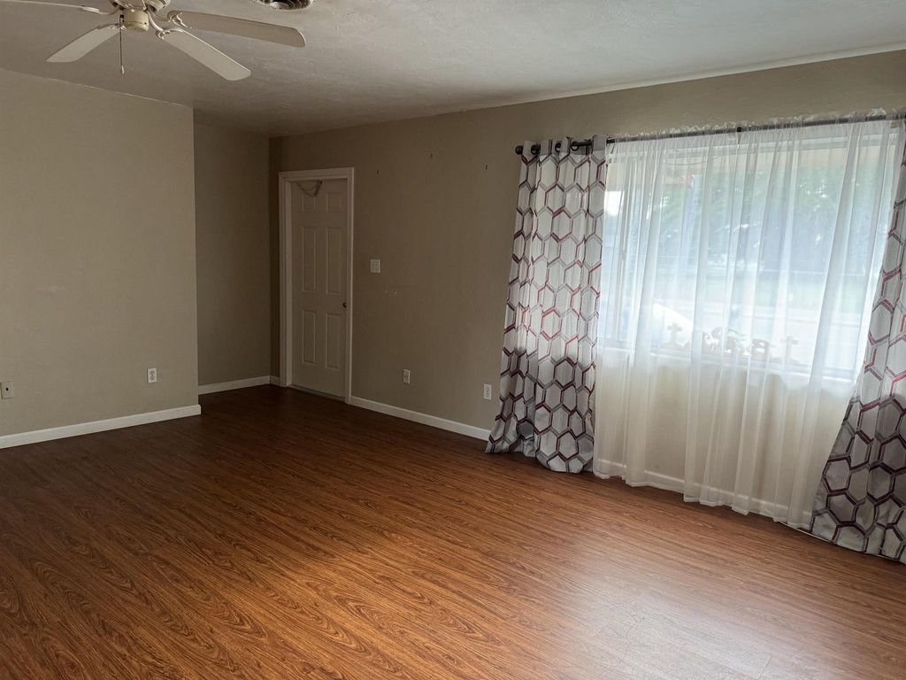 Photo of 601 NW 7th Street, Belle Glade, FL 33430 (MLS # R10987183)