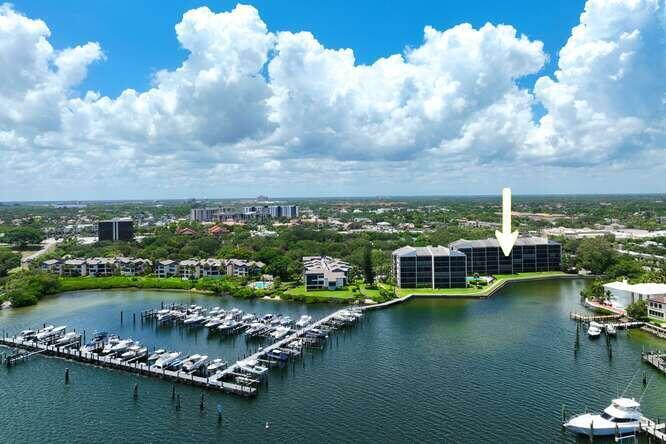 Experience serene coastal living in this spacious 2-bedroom, 2-bath condo in the desirable waterfront community of Twelve Oaks. Enjoy breathtaking Intracoastal views from light-filled living and dining areas that flow to a screened balcony. Enjoy cooking meals in the bright & airy kitchen, perfect for everyday or entertaining with family & friends. The primary suite features a walk-in closet, dual vanities, soaking tub, and separate shower, while the split plan ensures guest privacy. Community amenities include a heated pool, tennis courts, library, on-site management, dock access, and 24/7 guard gate. Ideally located near PGA Blvd dining, shopping, and golf courses. Twelve Oaks offers premier waterfront living in the heart of Palm Beach County.