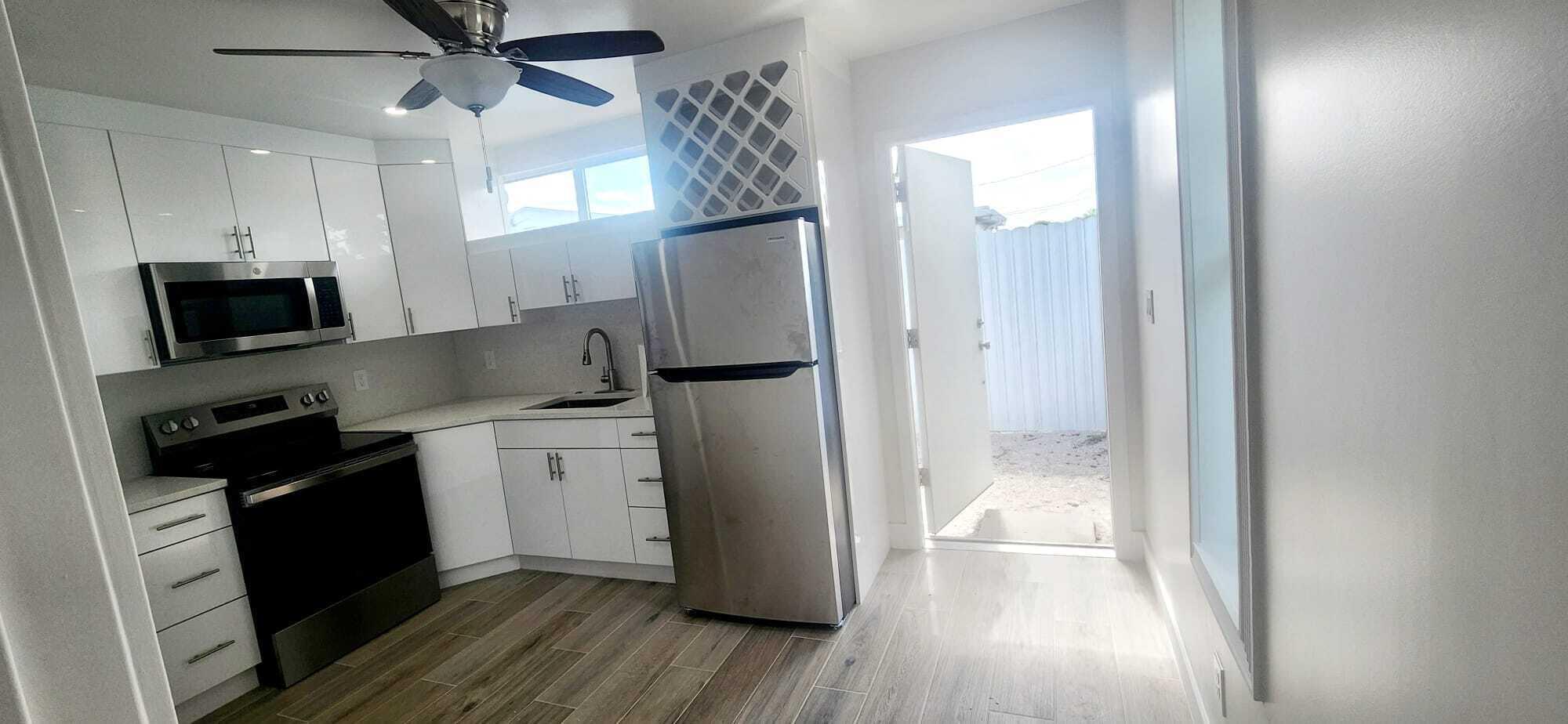 This beautiful 1-bedroom, 1-bathroom Efficiency has been completely remodeled to offer a perfect blend of comfort. With plenty of natural light and a cozy atmosphere. The bathrooms have been tastefully updated with high-quality fixtures and finishes. Enjoy the convenience of having ALL UTILITIES INCLUDED in your rent. This property is located in a friendly and quiet neighborhood, offering peace and privacy without HOA.  Back patio is shared with the front house tenants