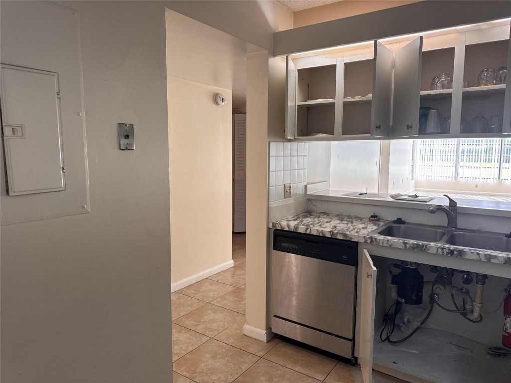 Photo of 3626 Whitehall Drive #103, West Palm Beach, FL 33401 (MLS # F10534307)