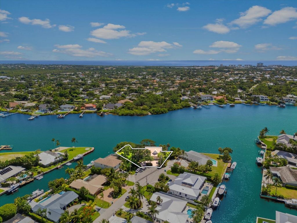 Photo of 35 Tradewinds Circle, Tequesta, FL 33469 (MLS # R11101859)