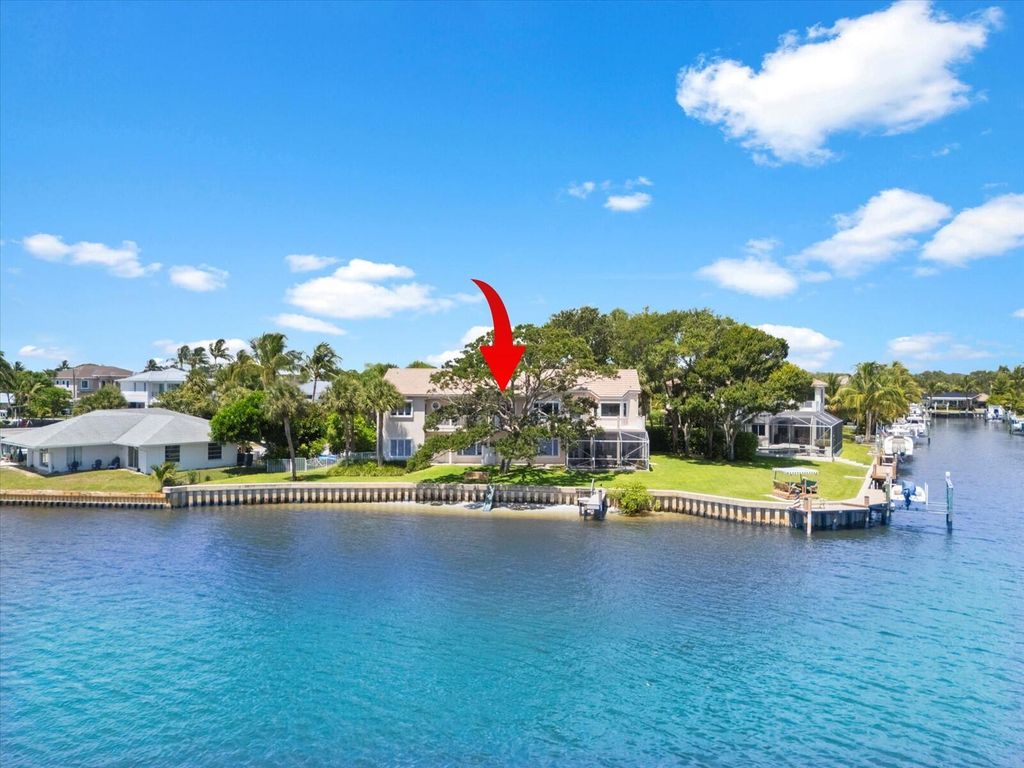 Photo of 35 Tradewinds Circle, Tequesta, FL 33469 (MLS # R11101859)