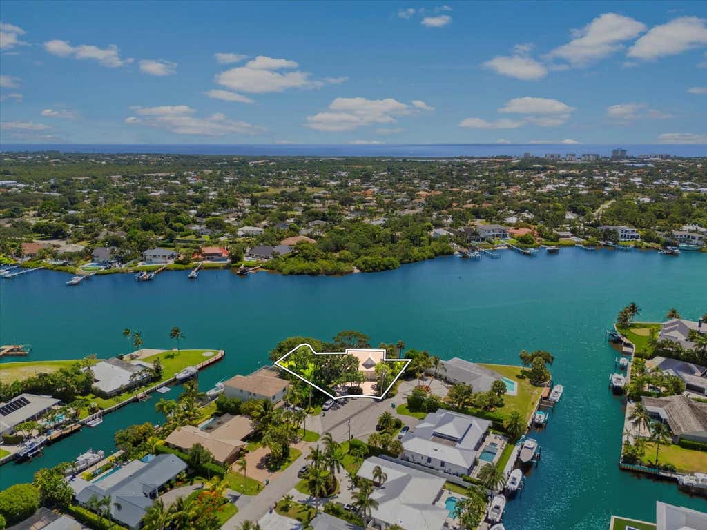 Photo of 35 Tradewinds Circle, Tequesta, FL 33469 (MLS # R11101859)
