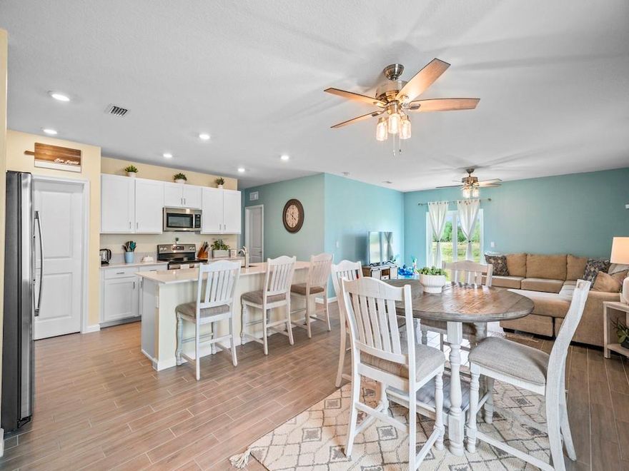 New build without the wait! Under Warranty until 8/23. SAVE ON INSURANCE w/ Impact doors/windows for maximum wind mitigation. This 6 BR/3 BA home is commuter friendly located minutes from I-95, turnpike, beaches, and historic downtown Ft. Pierce in a well-maintained gated community featuring resort style amenities - community pool, tennis courts, basketball, a clubhouse, and a playground. Home features: Upgraded tile shower surrounds and bathroom fixtures, quartz countertops 18”X6” tile in wet areas, Ring alarm system & video doorbell, 2” blinds, gutters, ceiling fans, fresh landscaping and irrigation system. Truly turnkey ready! Schedule a showing today