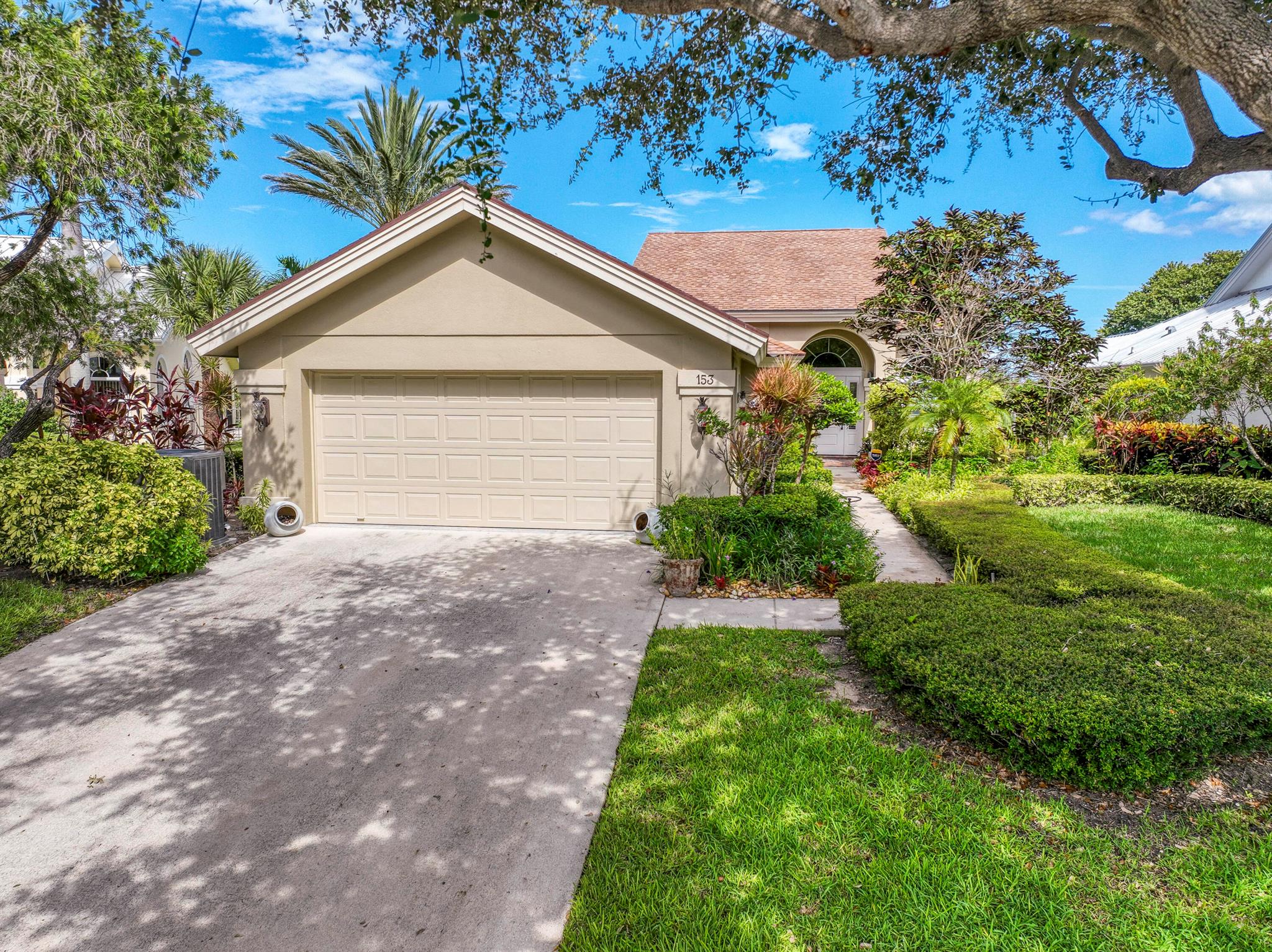 This stunning one-of-a-kind custom designed Bluffs DiVosta model is larger and has an exclusive intuitive layout. DiVosta built 4 special homes for their family on the exclusive Ridge Road cul-de-sac closest to the beach. The major design changes are a dedicated brightly lit breakfast area upon entering the home, a vaulted ceiling in the middle bedroom and re-designed bathroom layouts. Real skylights adorn both bathrooms and large arched windows illuminate various areas of the home. ALL Bluffs homes should have been like this! This is your chance to own an original. The Ridge at the Bluffs is situated in the center of all that Jupiter has to offer and is steps to the beach and Ocean Cay Park. Jupiter has become a mecca of highly rated restaurants, luxury retail and lifestyle brands as