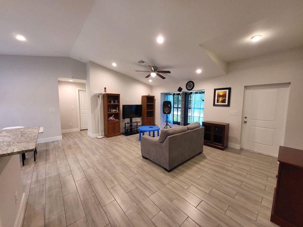 Photo of 1046 S Cheney Ave Avenue S, Lehigh Acres, FL 33974 (MLS # B26030289)