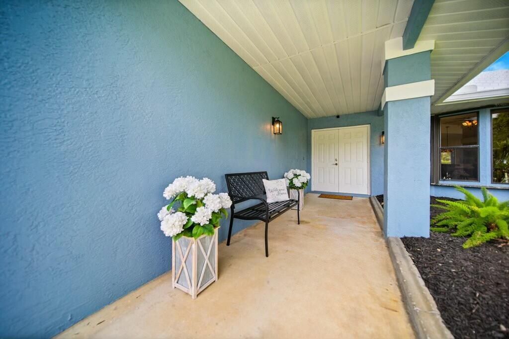 Photo of 870 SW Gardens Boulevard, Palm City, FL 34990 (MLS # R11079331)