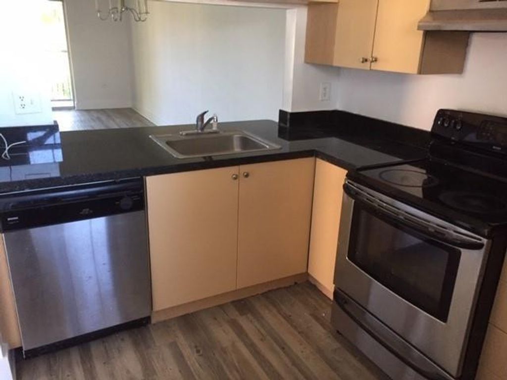 Photo of 729 NW 103RD Terrace #201, Pembroke Pines, FL 33026 (MLS # B26056347)
