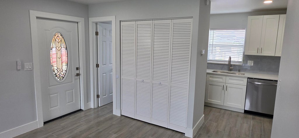 Photo of 351 Lake Dora Drive, West Palm Beach, FL 33411 (MLS # B26037196)