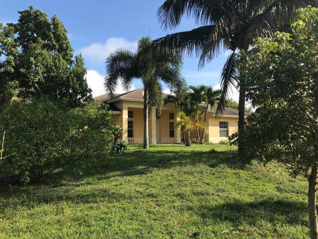 Photo of 17837 32ND Lane N, The Acreage, FL 33470 (MLS # B26074637)