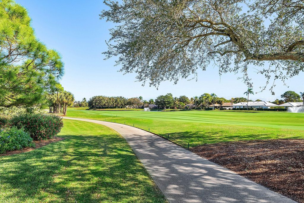 Photo of 115 Palm Point Circle #A, Palm Beach Gardens, FL 33418 (MLS # R11156718)