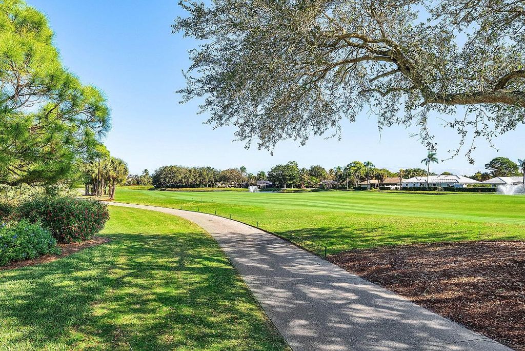 Photo of 115 Palm Point Circle #A, Palm Beach Gardens, FL 33418 (MLS # R11156718)