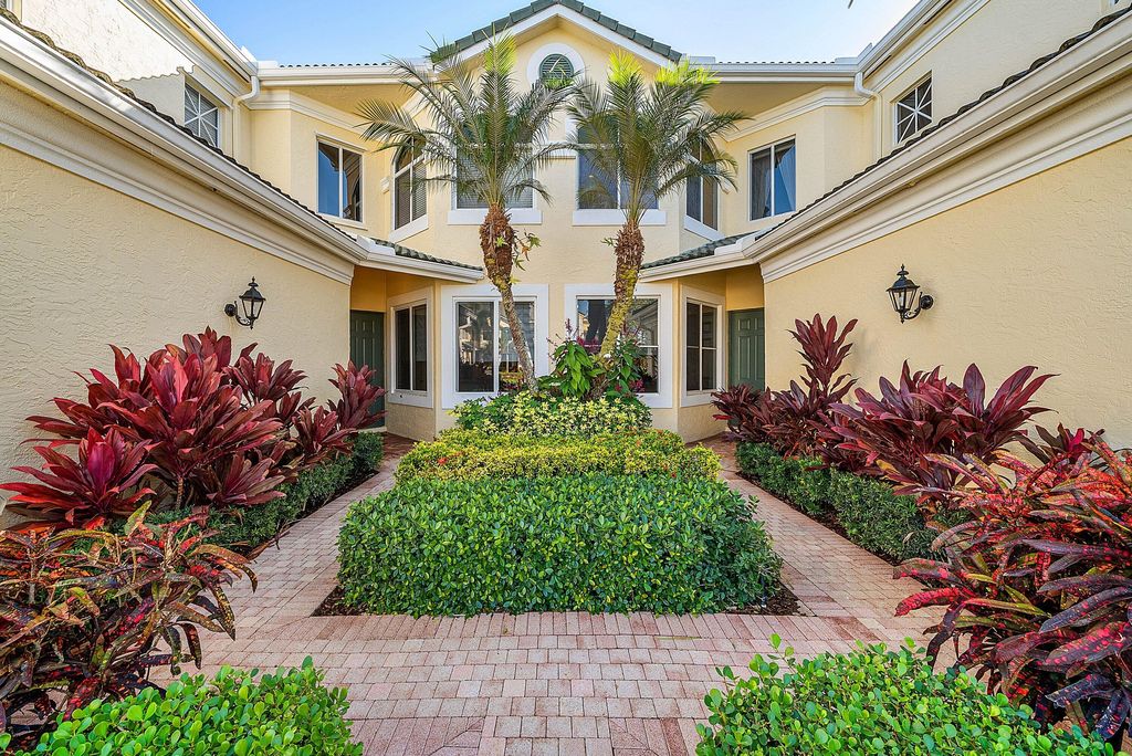 Photo of 115 Palm Point Circle #A, Palm Beach Gardens, FL 33418 (MLS # R11156718)