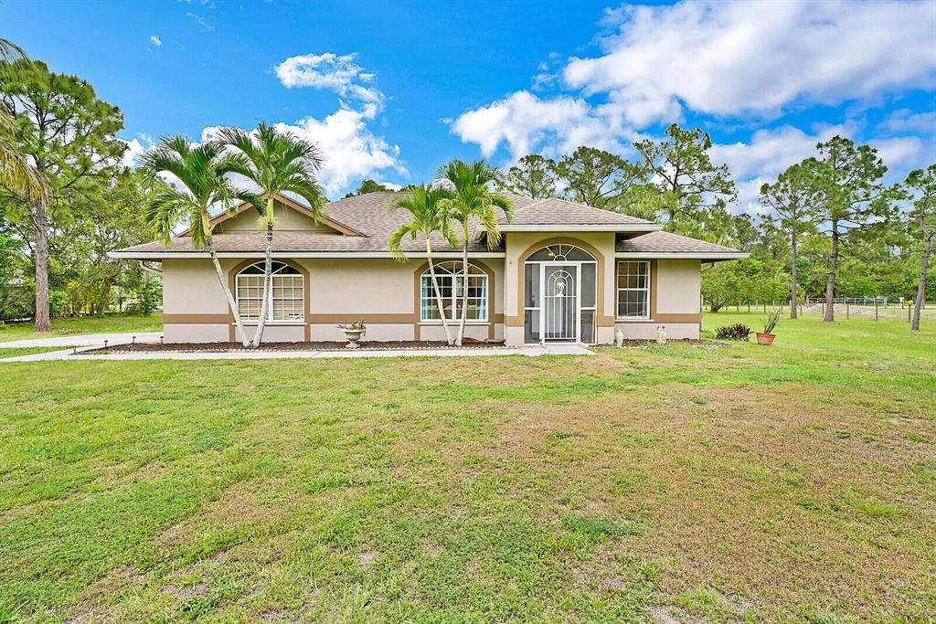 Photo of 18347 Murcott Boulevard Blvd, The Acreage, FL 33470 (MLS # R10789948)