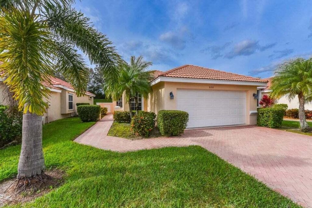 Photo of 650 SW Treasure Cove, Port Saint Lucie, FL 34986 (MLS # R10986552)