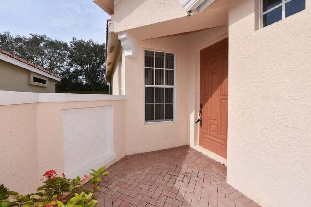 Photo of 650 SW Treasure Cove, Port Saint Lucie, FL 34986 (MLS # R10986552)