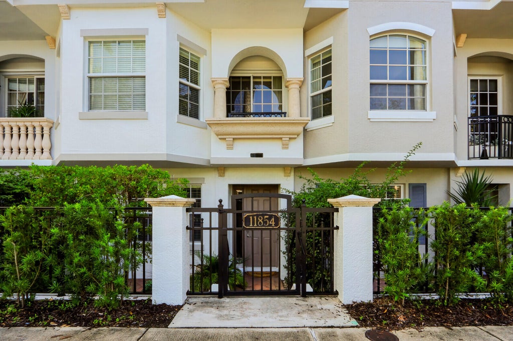 Photo of 11854 VALENCIA GARDENS Avenue, Palm Beach Gardens, FL 33410 (MLS # B26092824)
