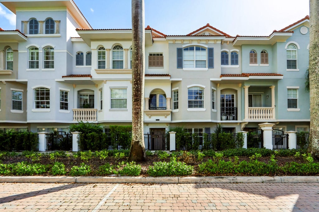 Photo of 11854 VALENCIA GARDENS Avenue, Palm Beach Gardens, FL 33410 (MLS # B26092824)