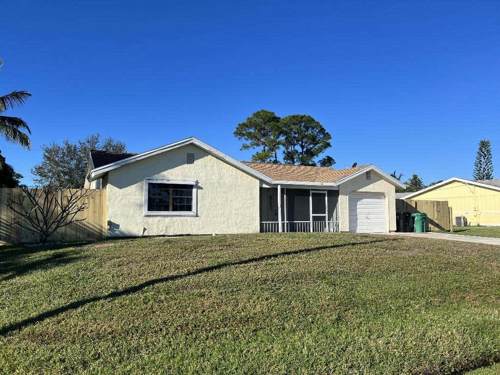 Photo of 142 SE Whitmore Drive, Port Saint Lucie, FL 34984 (MLS # R10946396)