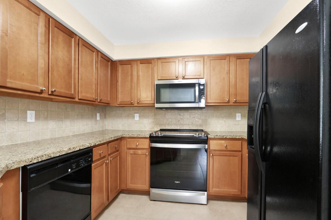 SOMERSET AT ABACOA CONDO - Residential