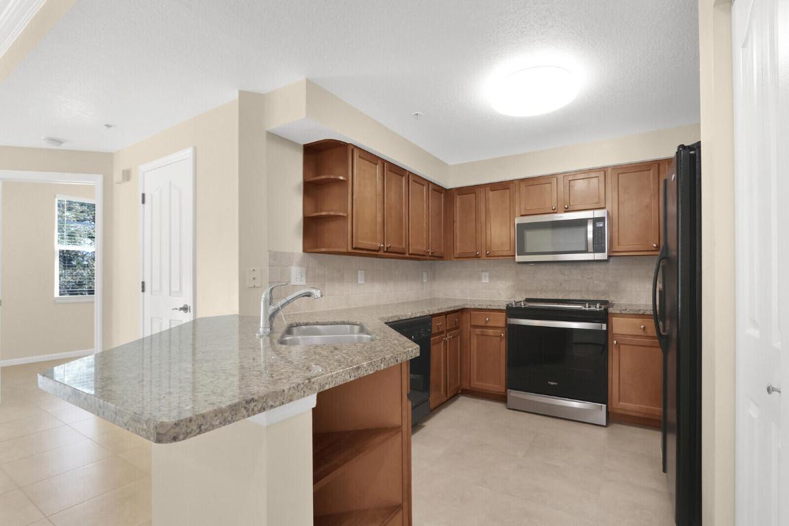 SOMERSET AT ABACOA CONDO - Residential