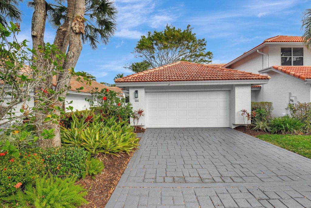 Photo of 2014 NW 52nd Street, Boca Raton, FL 33496 (MLS # R11053331)