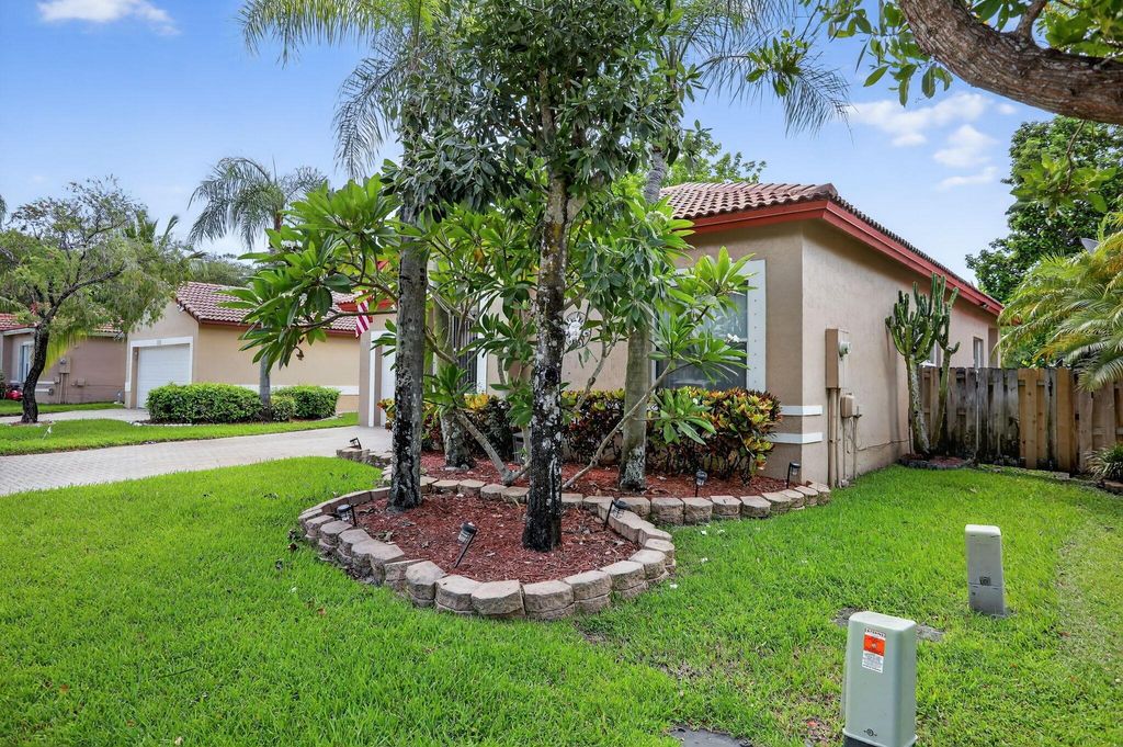 Photo of 6118 NW 41st Drive, Coral Springs, FL 33067 (MLS # R11116021)