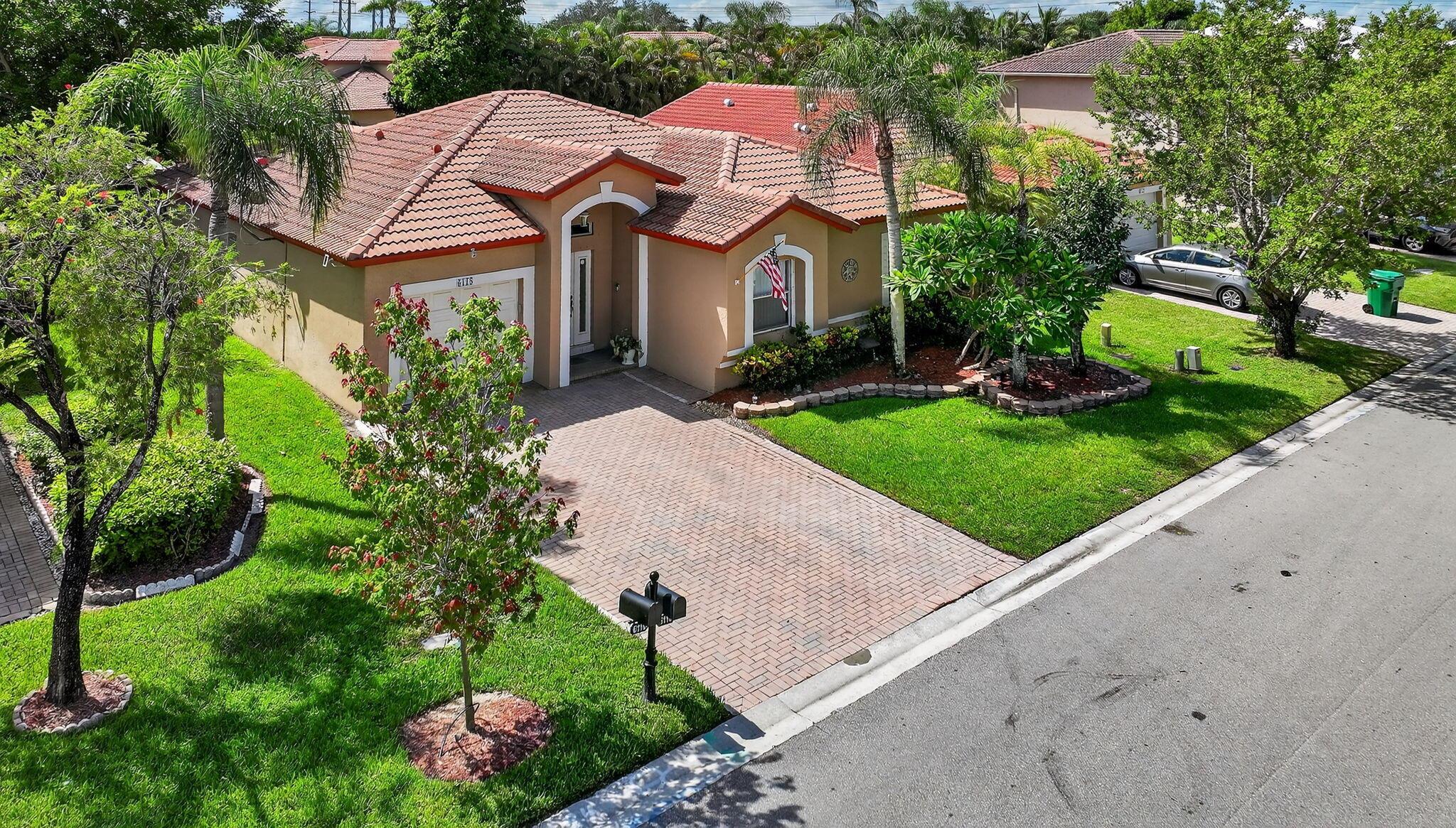 Beautiful 3-bedroom, 2-bath home in the sought-after Turtle Run community of Coral Springs. This well-maintained property features real wood kitchen cabinetry, granite countertops, stainless steel appliances, and updated systems including a 2-year-old HVAC. Enjoy laminate flooring throughout most of the home, a spacious master suite with dual sinks and a walk in shower and a fully fenced yard with hurricane shutters for added protection. Don't miss this opportunity to own a move-in-ready home in one of Coral Springs' most desirable neighborhoods--schedule your showing today!