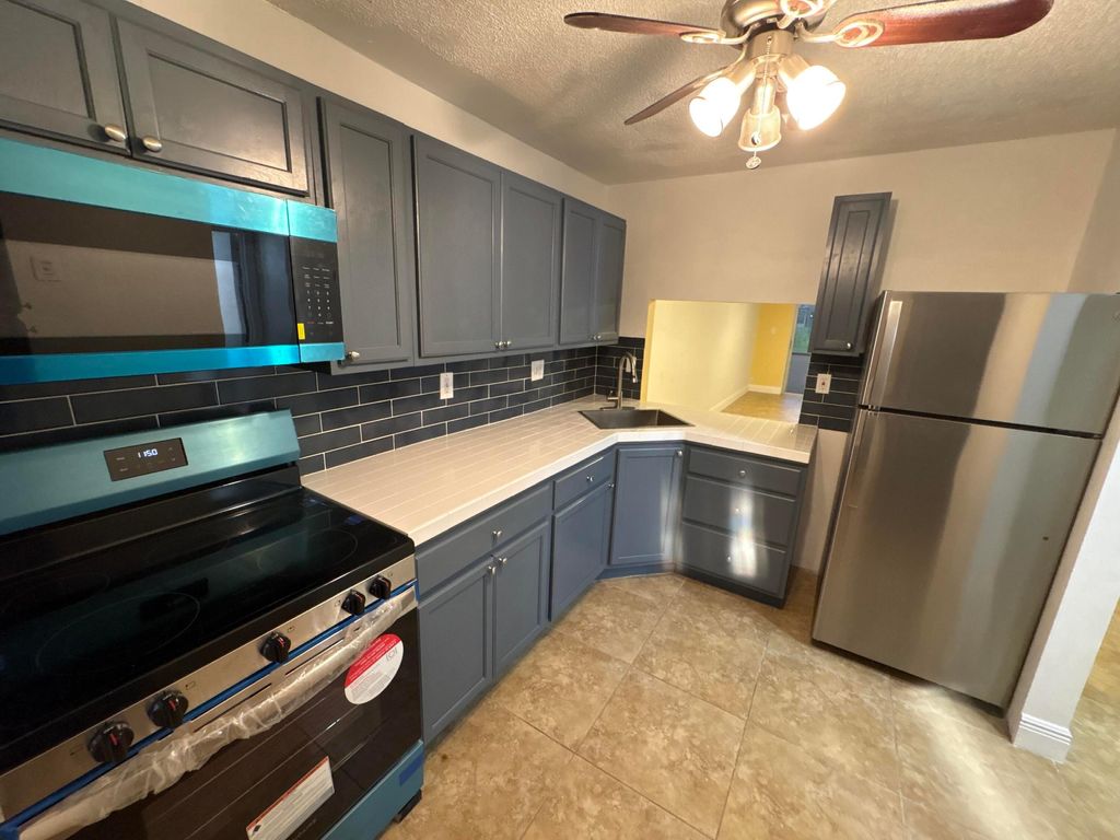 Photo of 1751 NW 75th Avenue #114, Plantation, FL 33313 (MLS # B26017180)