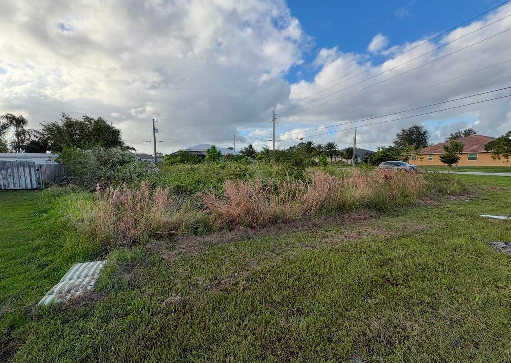 Photo of 3244 SW HAMBRICK Street, Port Saint Lucie, FL 34953 (MLS # B26061335)