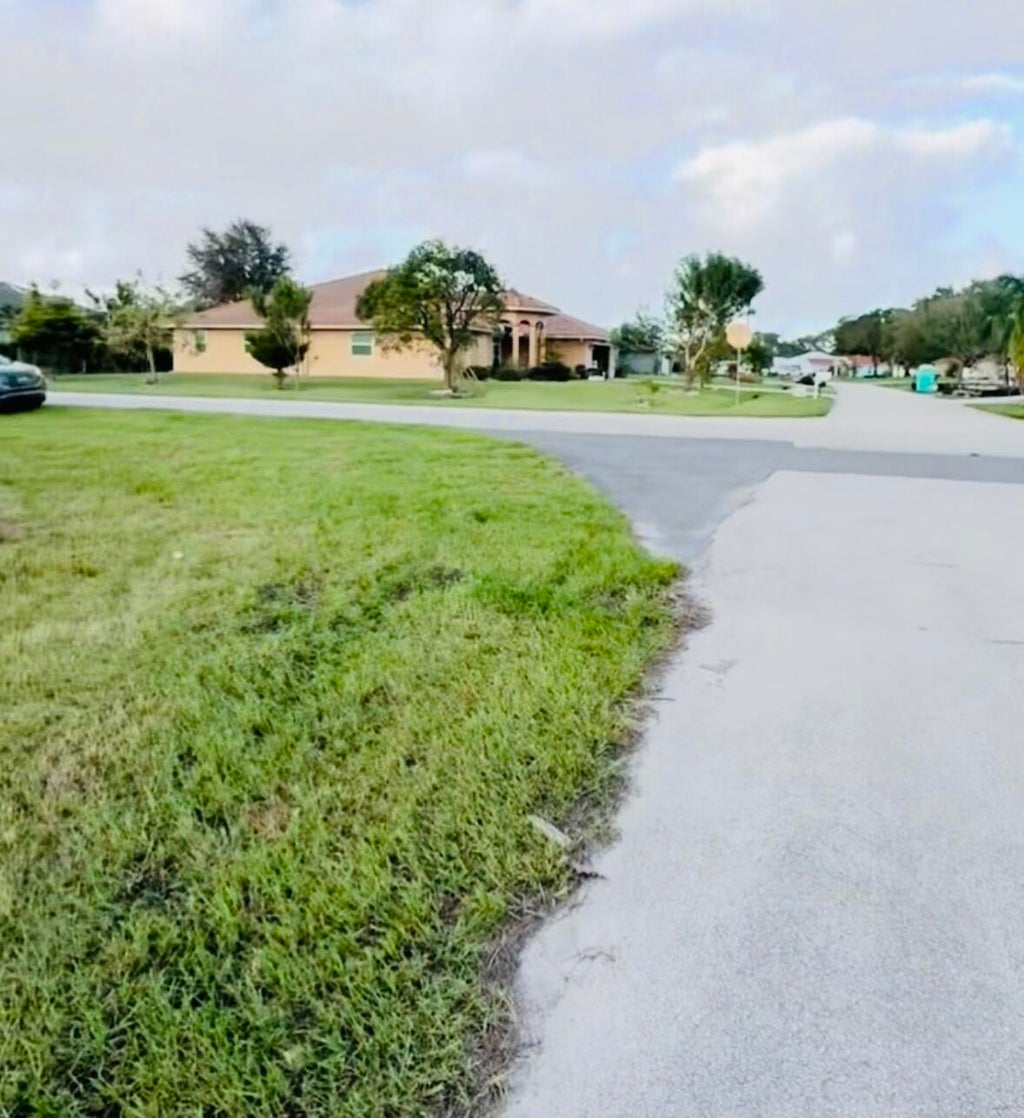 Photo of 3244 SW HAMBRICK Street, Port Saint Lucie, FL 34953 (MLS # B26061335)