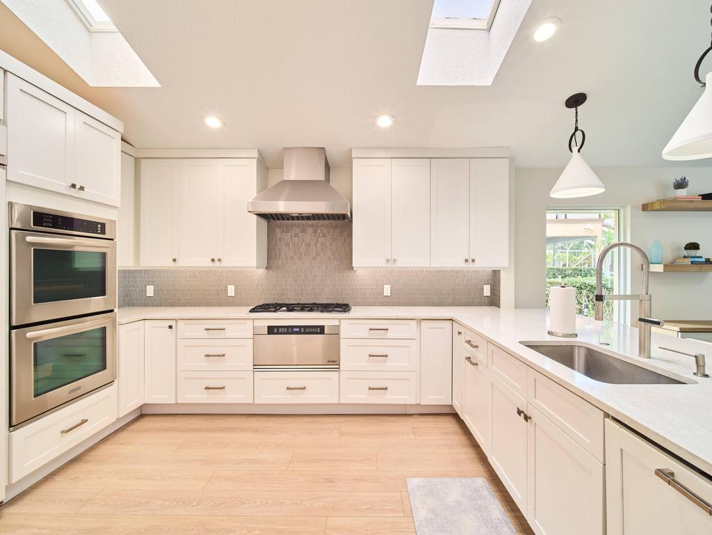 Photo of 140 Victorian Lane, Jupiter, FL 33458 (MLS # B26000876)