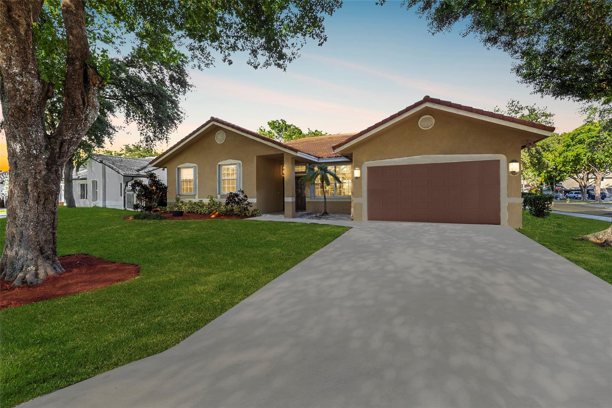 Welcome to one of the best values in Winston Park! This upgraded 42/ corner-lot home offers space, style, & serious peace of mind. With over 2,290 sqft of living space & a 2-car garage, it checks all the boxes: 2019 tile roof, brand-new 2024 AC, updated 2016 electrical panel, and full accordion shutters. The layout is thoughtfully designed, w/ oversized living areas & a spacious primary suite that feels like a private retreat. The kitchen is sleek & functional, complete w/ stainless steel appliances & plenty of prep space. Outside, enjoy a screened-in patio & an oversized 8,300+ sqft yard—ideal for a pool, garden, or full outdoor kitchen setup. You're minutes from The Promenade’s shops & restaurants, Sabal Pines parks, & just 15 minutes from beautiful South Florida beaches. Stay Friendly!