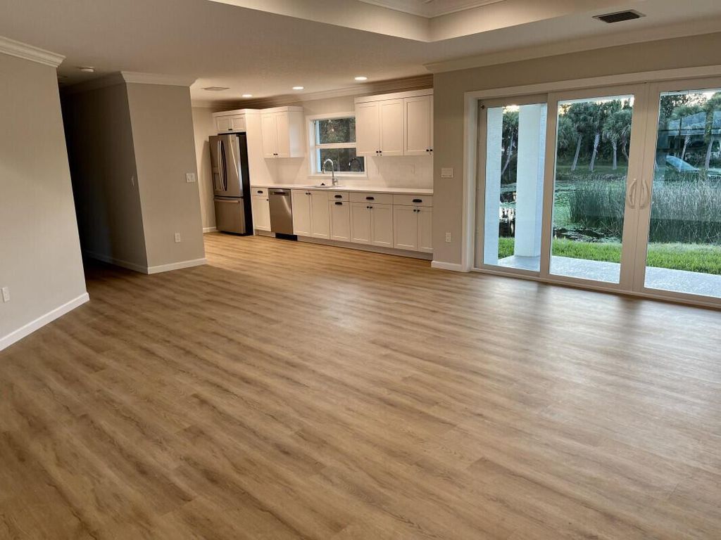 Photo of 5580 SE Colee Avenue, Stuart, FL 34997 (MLS # R10940178)