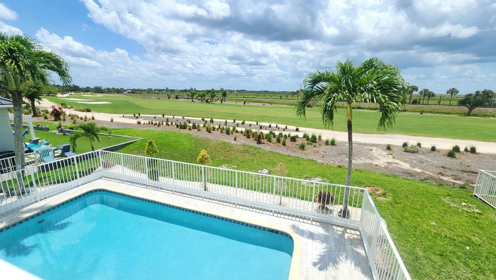 Photo of 1851 Corsica Drive, Wellington, FL 33414 (MLS # B26019088)