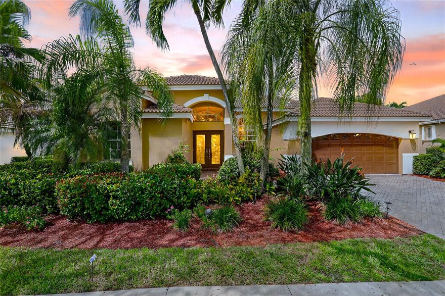WOW! Lowest price 5BD home in Weston Hills! Shows like a model! Light, bright & airy, beautiful single-story, almost 3000sf/ac, situated on a picturesque tree-lined street. French doors with impact glass open to a crisp, freshly painted interior bathed in warm natural light, with high ceilings, brand-new LED lights & new modern chandeliers (Oct 2025). The expansive 3-split floor plan features a primary suite w/generous sitting room, great as exercise area. The large den with custom built-ins is perfect as home office. White/granite kitchen w/stainless appliances, stone backsplash, new modern hardware. Tile in all liv areas, newer luxury vinyl in bedrooms. Generous covered patio & charming private garden provides a peaceful backyard oasis. Around the corner from the comm park & golf course.