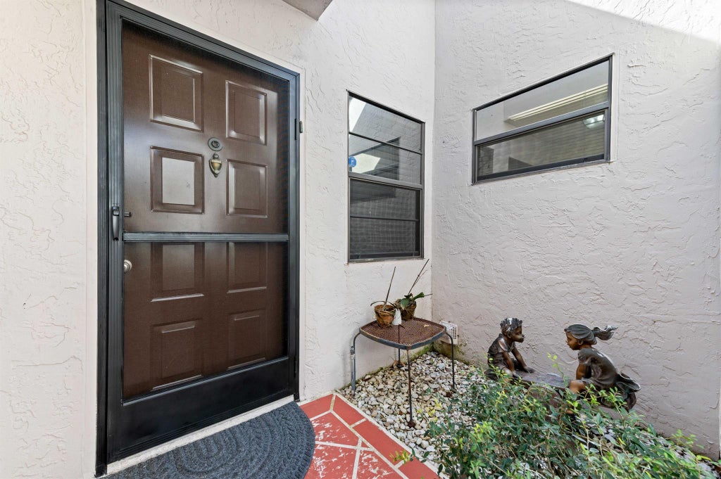 Photo of 6126 Sunny Pointe Circle, Delray Beach, FL 33484 (MLS # R11140646)