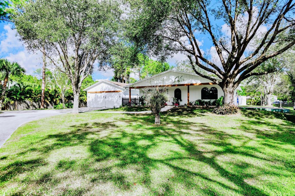 Photo of 10771 Sandy Run Road, Jupiter, FL 33478 (MLS # R10929817)
