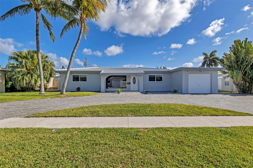 Rarely available for annual rent- Spacious 3 Bedroom 2 Bath single family home in "The Cove" in Deerfield Beach. One car attached garage. Relax in the Saltwater Pool in your private fenced yard-Perfect for entertaining. Pool Shower with new fixtures. All new Tinted Hurricane windows with custom shades. Freshly painted inside and out. Bright Eat in Kitchen with windows overlooking the pool. Bathrooms tastefully upgraded with new fixtures. Bright open Living and dining room with views of Pool. Laundry room off kitchen with Washer and Dryer Hookups. New air conditioning. Roof newly sealed and Painted. Security system with Cameras, Lawn and Pool service also included in rent. Tile floors and ceiling fans in all the rooms.