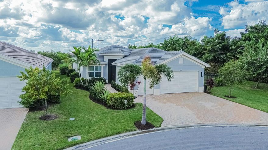 Located in Valencia Grove @ Riverland! Over $200k+ in owner & builder upgrades! Beautiful lake-view 3BR/2.5BA/2.5CG home plus den, living & dining rooms, and breakfast nook on oversized lot. Enjoy your private heated saltwater pool & spa with picture-frame screen enclosure. Features include wood-look tile floors, tray ceilings, motorized shade, impact windows & covered lanai. Kitchen offers gas cooking, stainless steel appliances, breakfast bar, granite counters & tankless gas water heater. Primary suite w/2 walk-in closets, dual sinks & tiled shower. Whole-house surge suppressor, fenced yard & cul-de-sac location. 55+ resort-style community w/clubhouse, fitness, tennis, pickleball & indoor/outdoor pools!